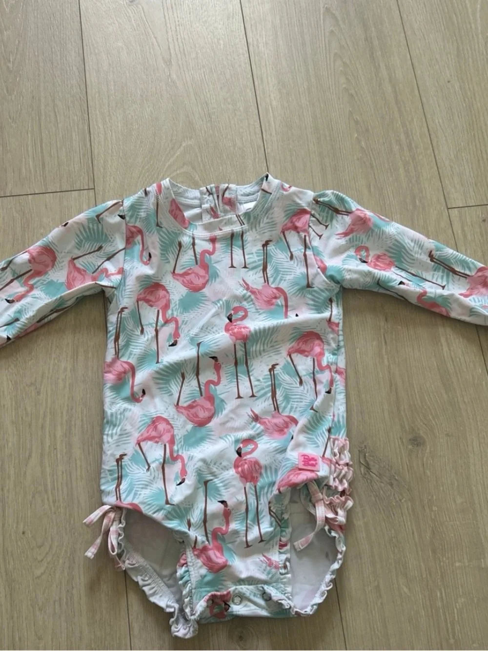 RUFFLEBUTTS Pink Flamingo Long Sleeve One-Piece Swimsuit